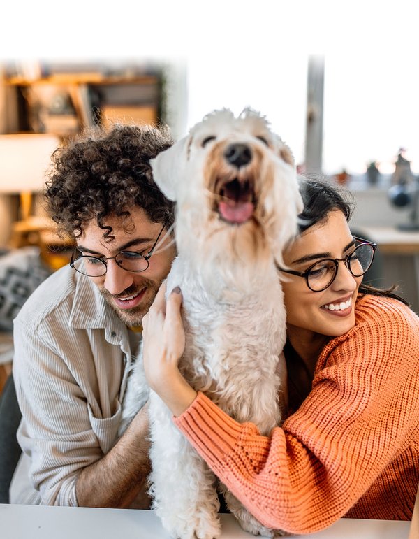 A couple with their dog